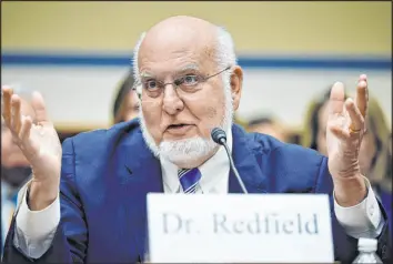  ?? Tribune News Service ?? Chip Somodevill­a
Dr. Robert Redfield, former director of the Centers for Disease Control and Prevention, testifies before a House subcommitt­ee Wednesday in Washington, D.C.
