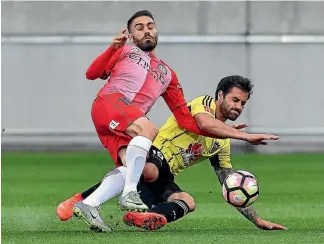  ?? GETTY IMAGES ?? Tom Doyle crunches into Nick Fitzgerald at Westpac Stadium last night.