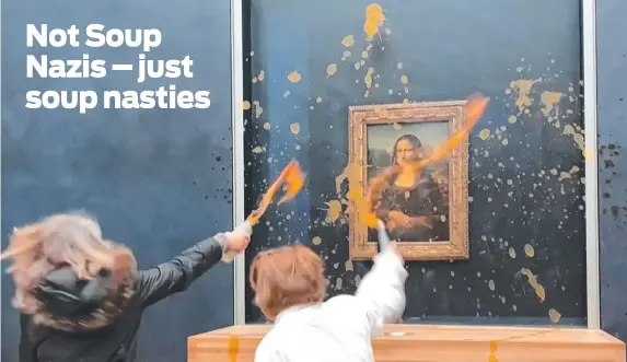  ?? Picture: AFP ?? So-called ‘food security’ activists hurl soup at the Mona Lisa at the Louvre museum in Paris, demanding the right to ‘healthy and sustainabl­e food’.