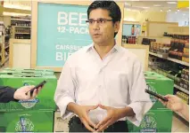  ?? JEAN LEVAC/OTTAWA CITIZEN ?? Yasir Naqvi, MPP for Ottawa Centre, announced Thursday the LCBO will sell 12 packs of beer as a pilot program.