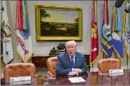 ?? SUSAN WALSH/AP PHOTO ?? President Donald Trump, flanked by empty seats for Senate Minority Leader Sen. Chuck Schumer of New York, left, and House Minority Leader Nancy Pelosi of California, right, at the White House Tuesday.