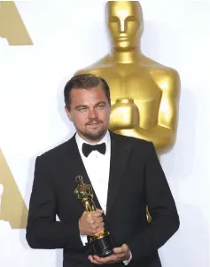  ?? — Reuters file photo ?? Best Actor winner DiCaprio poses with his Oscar at the 88th Academy Awards in Hollywood, California on Feb 28, 2016.