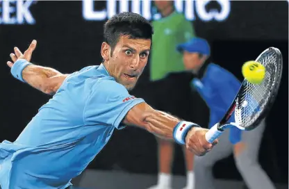  ?? /Reuters ?? Eyeball: Novak Djokovic at full stretch in his opening match against Fernando Verdasco in Melbourne on Tuesday.