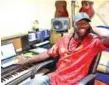  ??  ?? Sierra Leonean popstar Emmerson posing at his studio in Freetown, Sierra Loene.—AFP