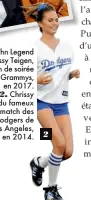  ??  ?? 1. John Legend et Chrissy Teigen, en fin de soirée des Grammys, en 2017. 2. Chrissy lors du fameux match des Dodgers de Los Angeles, en 2014. 2
