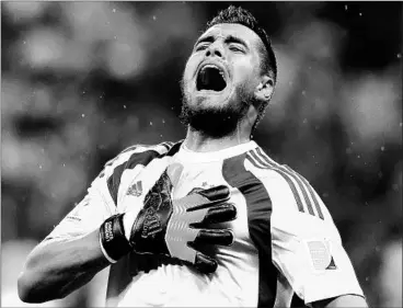  ?? SEBASTIAO MOREIRA/EPA PHOTO ?? Goalkeeper Sergio Romero celebrates after blocking a penalty kick in Argentina’s win. Romero saved two penalty kicks.