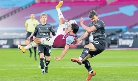  ??  ?? West Ham’s Pablo Fornals attempts an overhead kick.