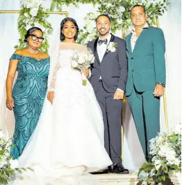  ?? ?? Guiding the couple on their special day were Abbigayle’s parents, Grace and Paul Rambaran.