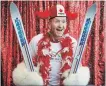  ?? JEFF MCINTOSH THE CANADIAN PRESS ?? Former Olympian Michael Edwards, also known as Eddie the Eagle, in a photo booth at an Olympic rally in Calgary on Nov. 5.