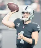  ?? CHRIS UNGER/GETTY IMAGES ?? Quarterbac­k Derek Carr played nine seasons for the Raiders before being released Feb. 14.