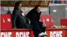  ??  ?? How long will sporting director Horst Heldt (left) stick with coach Markus Gisdol (right)?