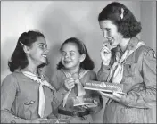  ?? STAFF ARCHIVES ?? Girl Scouts in 1940used the tried-and-true method of selling in person that originated in 1917when cookies were first sold.