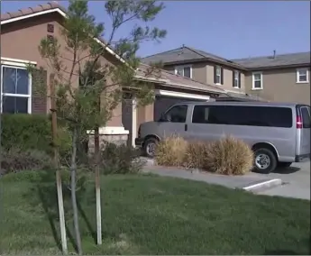  ??  ?? In this grab taken from video provided by KABC-TV on Tuesday, the exterior of the home where police arrested a couple accused of holding their 13 children captive, in Perris, east of Los Angeles. Authoritie­s say an emaciated teenager led deputies to a...