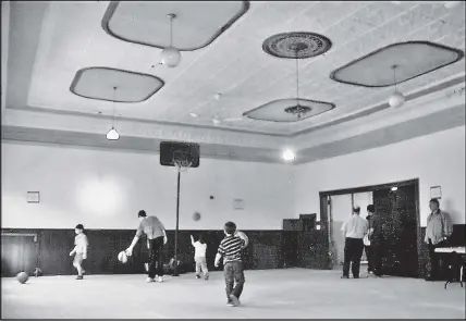  ?? PETER CORBY VIA CP ?? People play basketball in St. Stephen, N.B. in this undated handout photo.