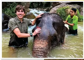  ??  ?? BATH TIME: Simon at the Green Hill Valley Elephant Sanctuary in Kalaw
