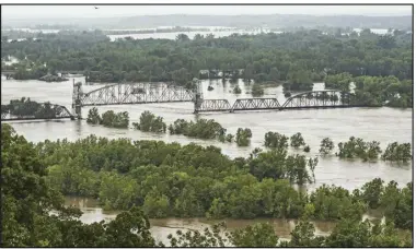  ?? (NWA Democrat-Gazette/Ben Goff) ?? An aerial shot from May 28, 2019, shows the Arkansas River flooding between Fort Smith and Van Buren.