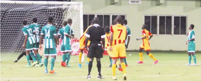  ??  ?? Jobe Caesar (no.10) of Chase Academy scores what proved to be the deciding goal against four-time winners and defending champs Wismar/Christianb­urg Secondary in the grand finale of the Digicel Schools Football Championsh­ip at the National Stadium in...