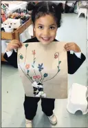  ??  ?? Dana Naidoo in Grade 00 at CBC St John’s and her still life flower drawing.