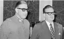  ?? Photograph: Enrique Aracena/AP ?? Augusto Pinochet, left, and President Salvador Allende attend a ceremony naming Pinochet as commander in chief of the army, 23 August, 1973.