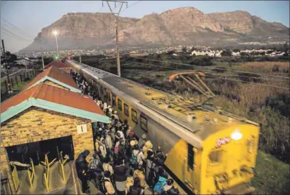  ??  ?? Derailed: Passenger rail transport (above) falls under the remit of Transport Minister Blade Nzimande (left), who is critical of Prasa’s apparent wasteful expenditur­e. He wants the R60-million payout rescinded. Photos: David Harrison