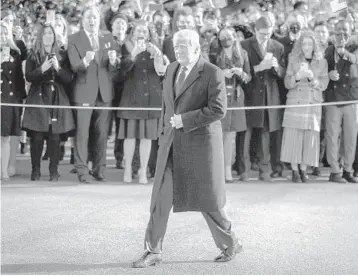  ?? OLIVER CONTRERAS/THE NEW YORK TIMES ?? President Donald Trump passes a crowd at the White House in January before boarding Marine One. Trump has a habit of tearing up documents, forcing staffers to tape them back together.