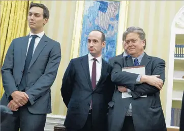  ?? Evan Vucci Associated Press ?? SENIOR aide Jared Kushner, from left, reported assets over $700 million; advisor Stephen Miller had $125,000 in income from the campaign; and Stephen Bannon reported over $1 million from Breitbart and other media.