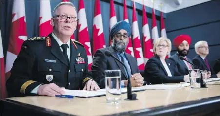  ??  ?? Gen. Jonathan Vance, Canada’s chief of the defence staff, left, speaks at Tuesday’s Ottawa news conference, joined by Defence Minister Harjit Sajjan, Procuremen­t Minister Carla Qualtrough, Economic Developmen­t Minister Navdeep Bains and Transport...