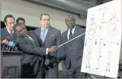  ?? RICH PEDRONCELL­I — THE ASSOCIATED PRESS ?? Pathologis­t, Dr. Bennet Omalu, uses a pointer on a diagram showing where police shooting victim Stephon Clark was struck by bullets, on Friday in Sacramento.