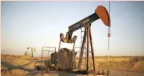  ??  ?? Pump Jacks are seen at sunrise near Bakersfiel­d, California, US. — Reuters