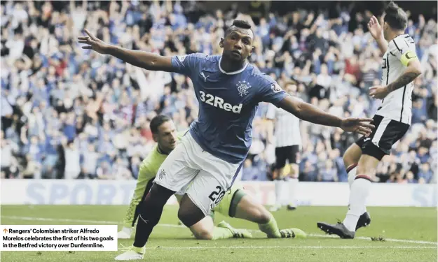  ??  ?? 0 Rangers’ Colombian striker Alfredo Morelos celebrates the first of his two goals in the Betfred victory over Dunfermlin­e.
