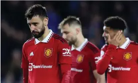  ?? Photograph: Robin Jones/Getty Images ?? Bruno Fernandes, Luke Shaw and Jadon Sancho trudge from the pitch following their agonising late defeat at Brighton.