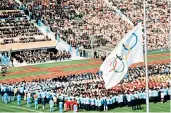  ??  ?? Solemn tribute: the flag flies at half mast during a memorial service in the Olympic Stadium in 1972. Left: the Israelis killed included, top row, from left: team coaches Moshe Weinberg, Kehat Shorr and Yakov Springer. Bottom row: referee Yossef Gutfreund, wrestler Eliezer Halfin and coach Amitzur Shapira