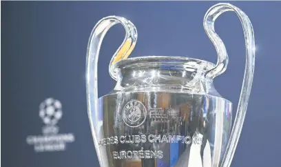  ?? Picture: AFP ?? ULTIMATE PRIZE. The Champions League trophy is displayed ahead of the quarterfin­al and semifinal draw at the House of European Football in Nyon yesterday.