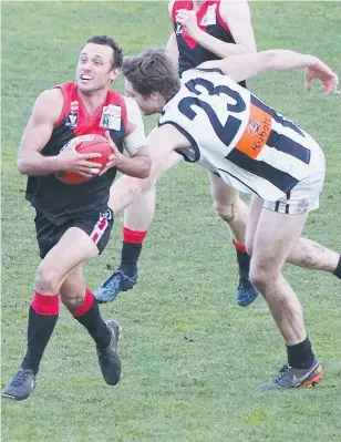  ??  ?? Always hard to catch Gull Brad Scalzo arches his back and breaks clear of a tackling attempt by Sale’s Jordan Dessent during Saturday’s senior match.