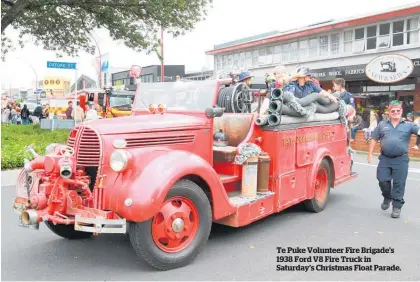  ??  ?? Te Puke Volunteer Fire Brigade’s 1938 Ford V8 Fire Truck in Saturday’s Christmas Float Parade.