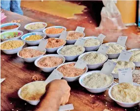  ?? ?? Rice prices rise amidst scarcity fears, and traders get to call the shots (Pix by Eshan Fernando and Indika Handuwala)