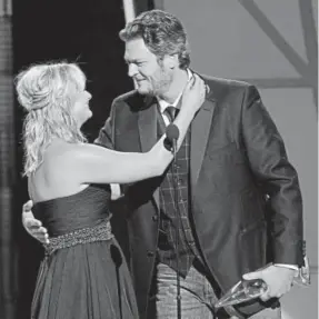  ?? Wayde Payne, Invision ?? Miranda Lambert and Blake Shelton at the 2012 Country Music Awards.