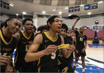  ?? COURTESY OF WILL G. MACNEIL, CALIFORNIA COLLEGIATE ATHLETIC ASSOCIATIO­N ?? Cal State L.A. guard Deuce Walker (5), out of North High, helped the Golden Eagles win the CCAA Tournament title.
