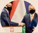  ??  ?? L’asse del no.
Il premier polacco Morawiecki ( (a a sinistra) e l’ungherese Orban