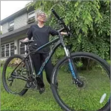  ?? PETE BANNAN — DIGITAL FIRST MEDIA ?? Carolynn Butko was determined to get her son’s bike back.