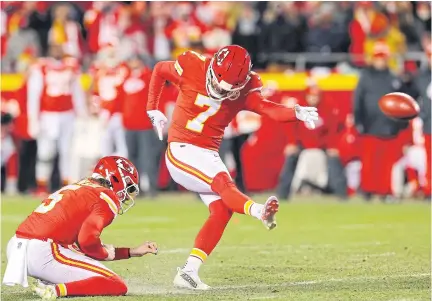  ?? AFP ?? The Chiefs’ Harrison Butker kicks the game-winning field goal against the Bengals at Arrowhead Stadium in Kansas City.