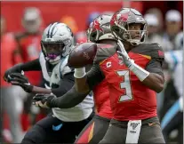  ?? TIM IRELAND - THE ASSOCIATED PRESS ?? Tampa Bay Buccaneers quarterbac­k Jameis Winston (3) passes against the Carolina Panthers during the second quarter of an NFL football game, Sunday, Oct. 13, 2019, at Tottenham Hotspur Stadium in London.