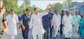  ?? PTI ?? Congress president Rahul Gandhi waves at his party supporters during a campaign in Karnataka’s Honnavar on Thursday.