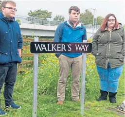  ??  ?? Andrew, Steven and Kirsty Walker at the unveiling of a path next to Diamond Bridge named in honour of tragic Ian Walker.