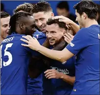  ??  ?? Drinkwater is acclaimed for his goal to put Chelsea two goals to the good in yesterday’s rout of Stoke GROUP HUG: