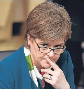  ?? Pictures: Getty Images. ?? Nicola Sturgeon is likely to be angered by UK ministers rejecting a bid to hand control of immigratio­n to the Scottish Parliament.