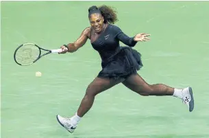  ?? EDUARDO MUNOZ ALVAREZ AFP/GETTY IMAGES ?? Serena Williams hits a return wearing a tutu during a U.S. Open match in New York on Monday.