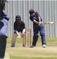  ?? ?? Carli Botha plays a cover shot. Left: Itumeleng Manyaga throws the ball during their practice match.