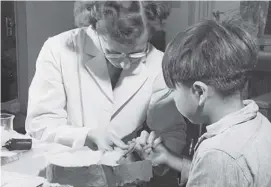  ?? Library and Archives Canada ?? A nurse takes a blood sample from a boy at the Indian School, Port Alberni, B.C., in 1948. Consent was not obtained for studies of the effects of nutritiona­l supplement­s.