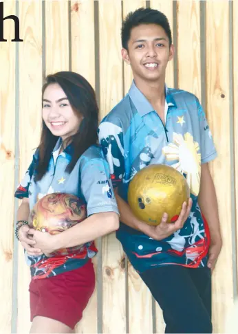  ?? (SUN.STAR FILE) ?? LAST CHANCE. After falling short in the doubles and singles events, Cebuano keglers Xyrra Cabusas and GJ Buyco will still get a chance to win a title for the PHL bowling team when they take part in the team of four event, the final event of the World...